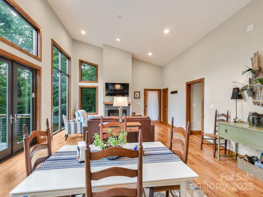 43 Tinkling Springs Lane, Fairview, NC 28730.  MLS# CAR4159981, YatesRealty ID 16392. Open Living, Dining from Kitchen