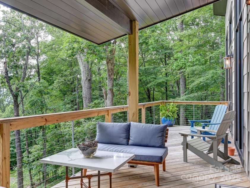 43 Tinkling Springs Lane, Fairview, NC 28730.  MLS# CAR4159981, YatesRealty ID 16392. Privacy in the Trees