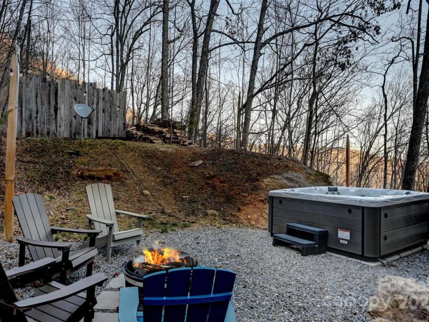 43 Tinkling Springs Lane, Fairview, NC 28730.  MLS# CAR4159981, YatesRealty ID 16392. Winter Entertaining Area