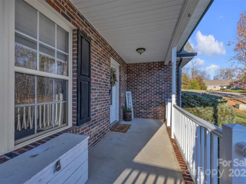 312 Oak Knoll, Hildebran, NC 28637.  MLS# CAR4325397, YatesRealty ID 16393. Covered Front Porch