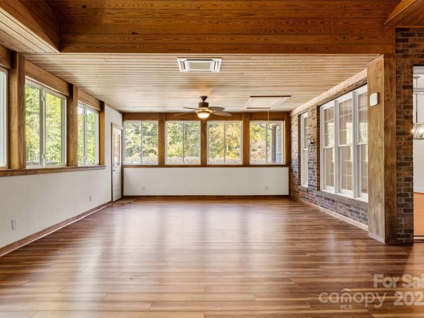 1427 Doe Ridge Lane, Fort Mill, SC 29715.  MLS# CAR4293414, YatesRealty ID 16397. Beautiful wood details warm this cozy place