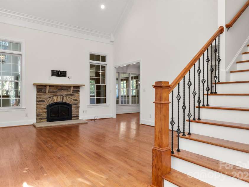 1427 Doe Ridge Lane, Fort Mill, SC 29715.  MLS# CAR4293414, YatesRealty ID 16397. Updated stone fire place to take out the chill on a cold day