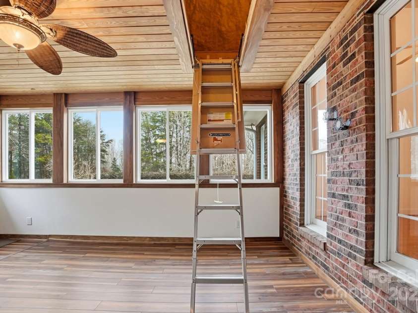 1427 Doe Ridge Lane, Fort Mill, SC 29715.  MLS# CAR4329491, YatesRealty ID 16397. Overhead storage in family room 