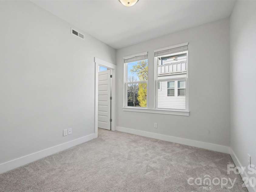 2128 Electric Lane, Charlotte, NC 28205.  MLS# CAR4357927, YatesRealty ID 16399. 3rd level second bedroom