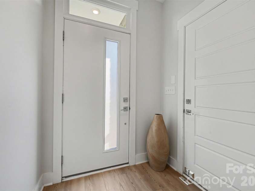 2128 Electric Lane, Charlotte, NC 28205.  MLS# CAR4357927, YatesRealty ID 16399. First front entrance 