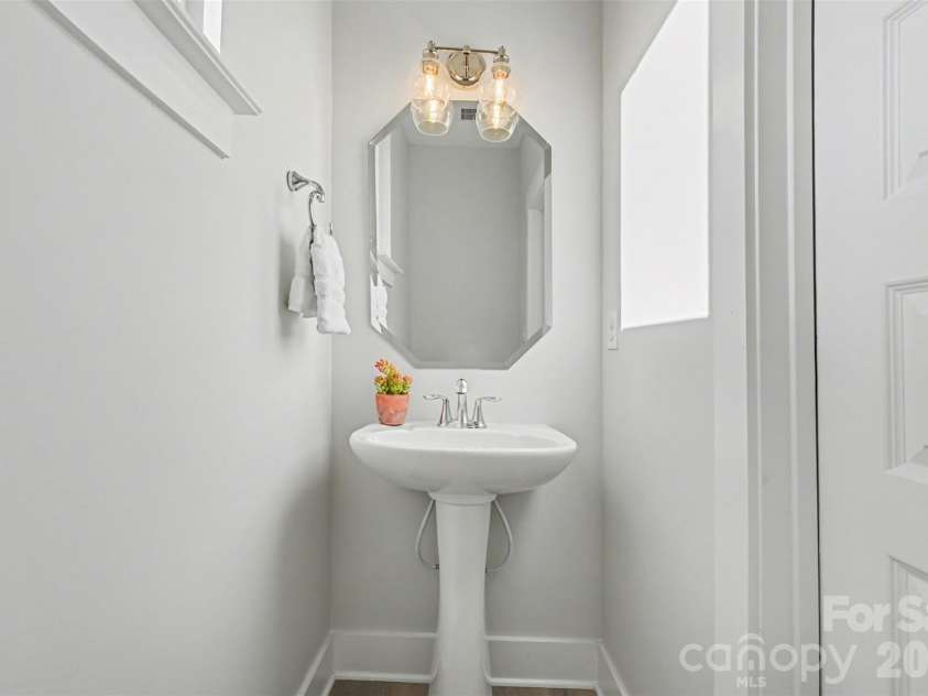2128 Electric Lane, Charlotte, NC 28205.  MLS# CAR4357927, YatesRealty ID 16399. Main floor half bath