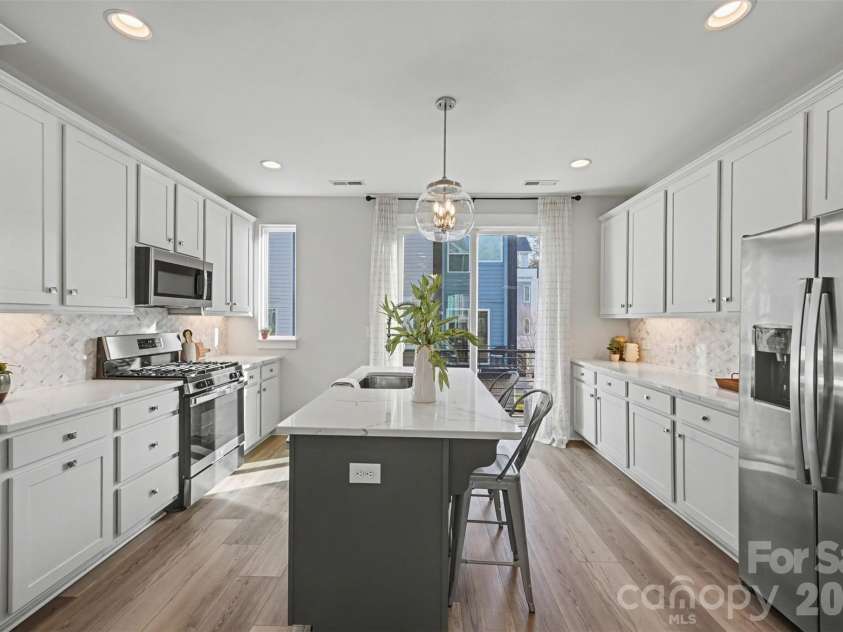 2128 Electric Lane, Charlotte, NC 28205.  MLS# CAR4357927, YatesRealty ID 16399. Main level kitchen