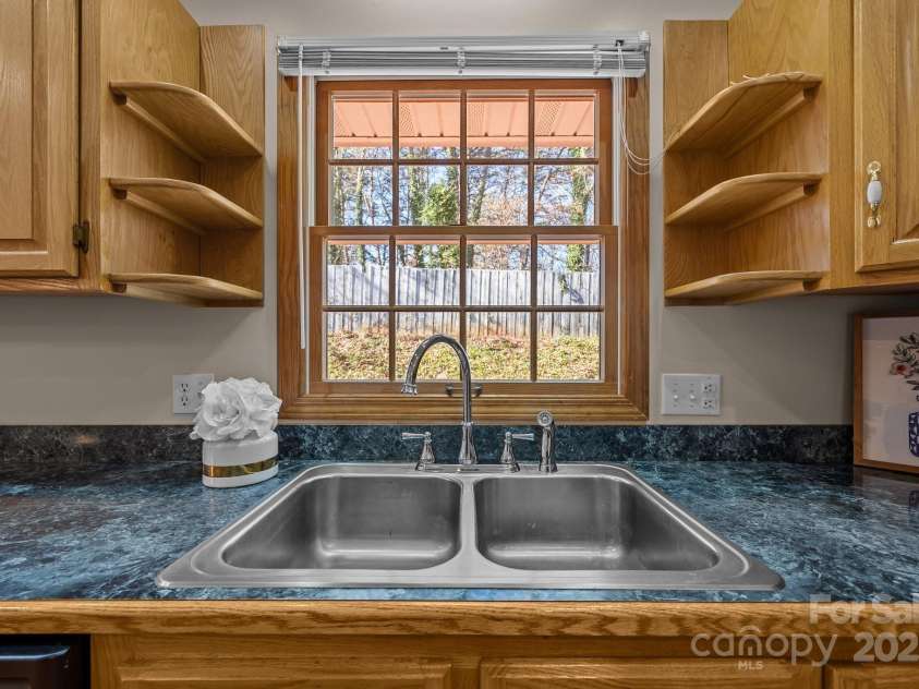 35 Clayton Drive, Weaverville, NC 28787.  MLS# CAR4199794, YatesRealty ID 16399. Window above kitchen sink