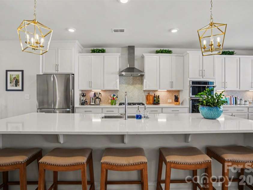 2647 Roseglen Lane, Indian Land, SC 29707.  MLS# CAR4315420, YatesRealty ID 16400. Chef's kitchen w/huge island and plenty of cabinets!