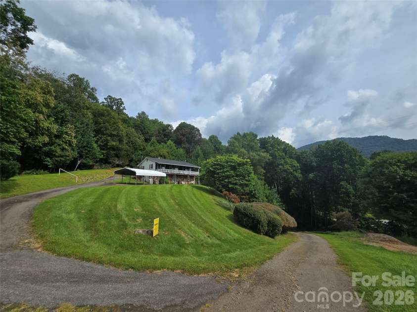 707 Lickskillet Road, Burnsville, NC 28714.  MLS# CAR4325739, YatesRealty ID 16401. 