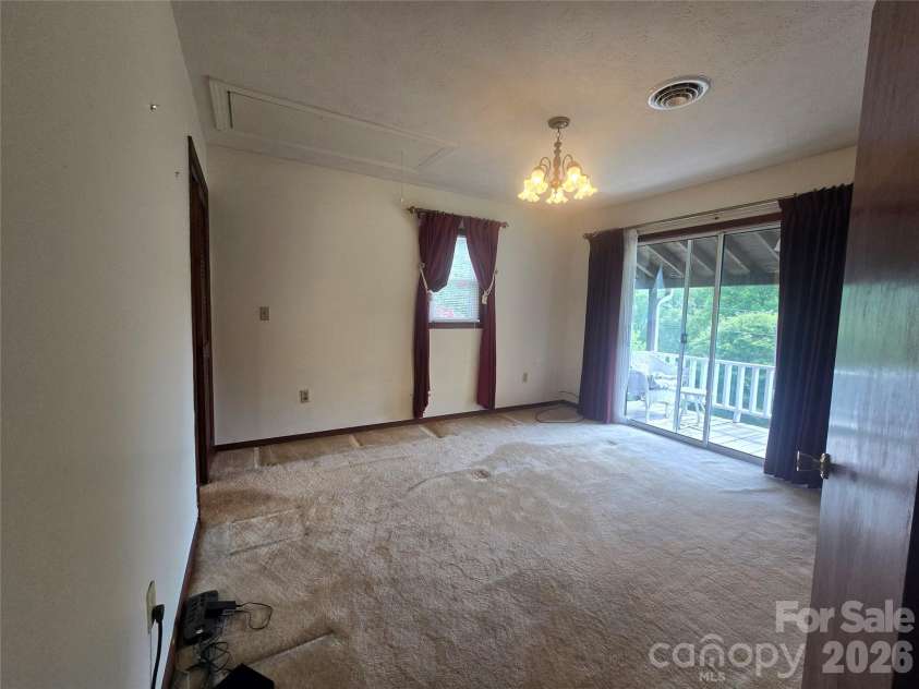707 Lickskillet Road, Burnsville, NC 28714.  MLS# CAR4325739, YatesRealty ID 16401. 