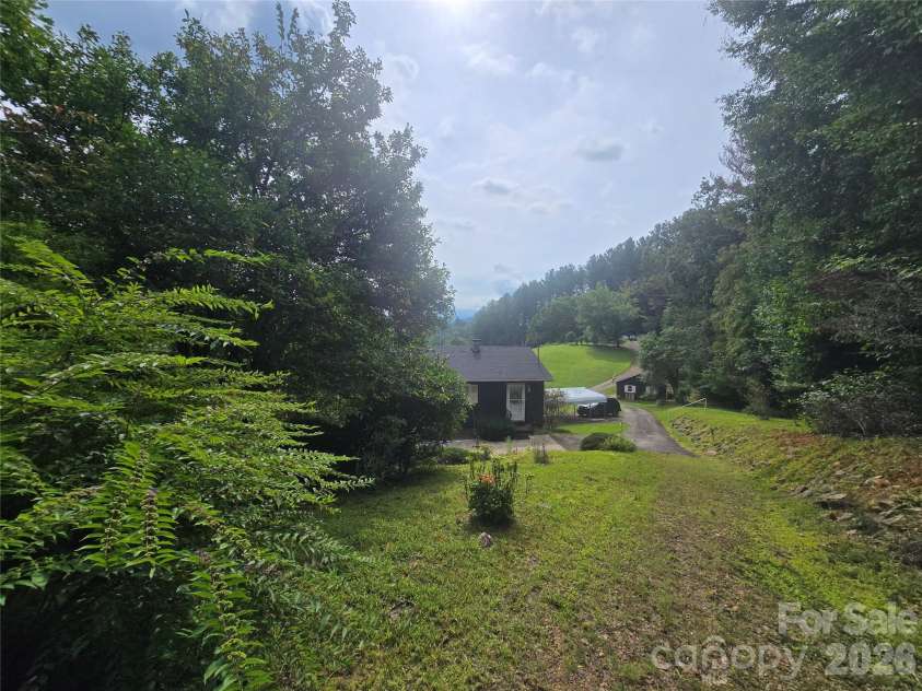 707 Lickskillet Road, Burnsville, NC 28714.  MLS# CAR4325739, YatesRealty ID 16401. 