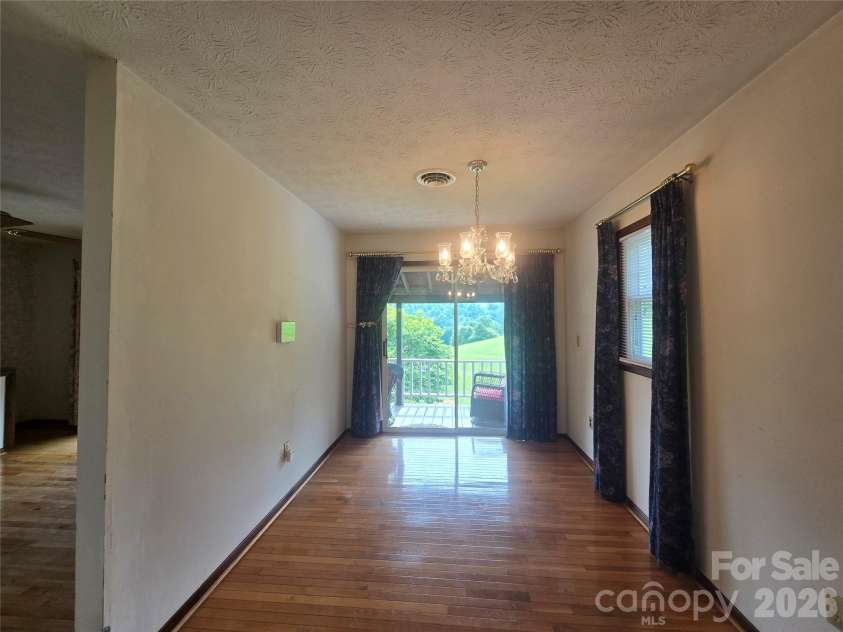 707 Lickskillet Road, Burnsville, NC 28714.  MLS# CAR4325739, YatesRealty ID 16401. 