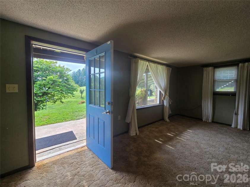 707 Lickskillet Road, Burnsville, NC 28714.  MLS# CAR4325739, YatesRealty ID 16401. 