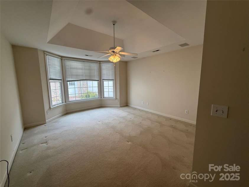 5476 Ives Street, Concord, NC 28027.  MLS# CAR4264518, YatesRealty ID 16403. Primary bedroom