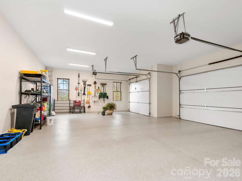 567 Wild River Run, Marshall, NC 28753.  MLS# CAR4353270, YatesRealty ID 16403. 3-car garage with epoxy floor.