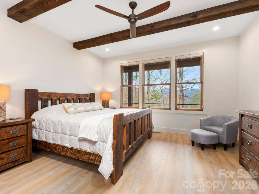 567 Wild River Run, Marshall, NC 28753.  MLS# CAR4353270, YatesRealty ID 16403. Lower level ensuite bedroom with walk-in closet.