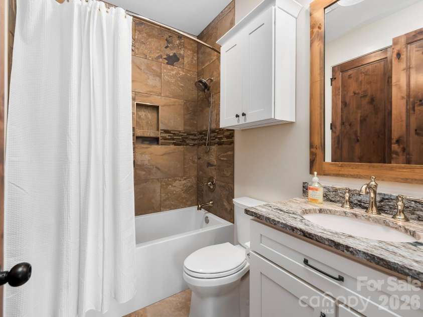 567 Wild River Run, Marshall, NC 28753.  MLS# CAR4353270, YatesRealty ID 16403. Lower level hall bathroom.