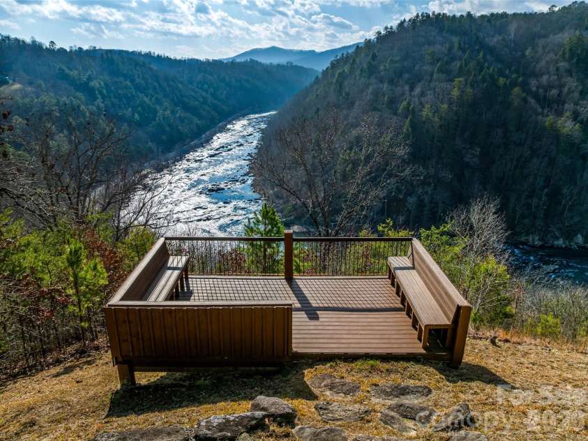 567 Wild River Run, Marshall, NC 28753.  MLS# CAR4353270, YatesRealty ID 16403. River overlook at the lodge