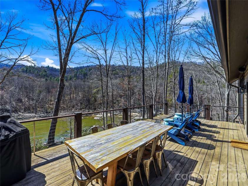 3735 French Broad Parkway, Marshall, NC 28753.  MLS# CAR4353806, YatesRealty ID 16404. Cook and dine riverside!