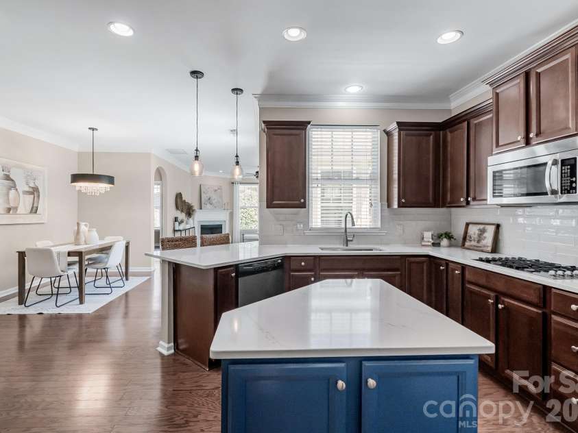 4419 Forest Gate Lane, Charlotte, NC 28270.  MLS# CAR4359056, YatesRealty ID 16405. Kitchen with view into open floor plan and more natural light