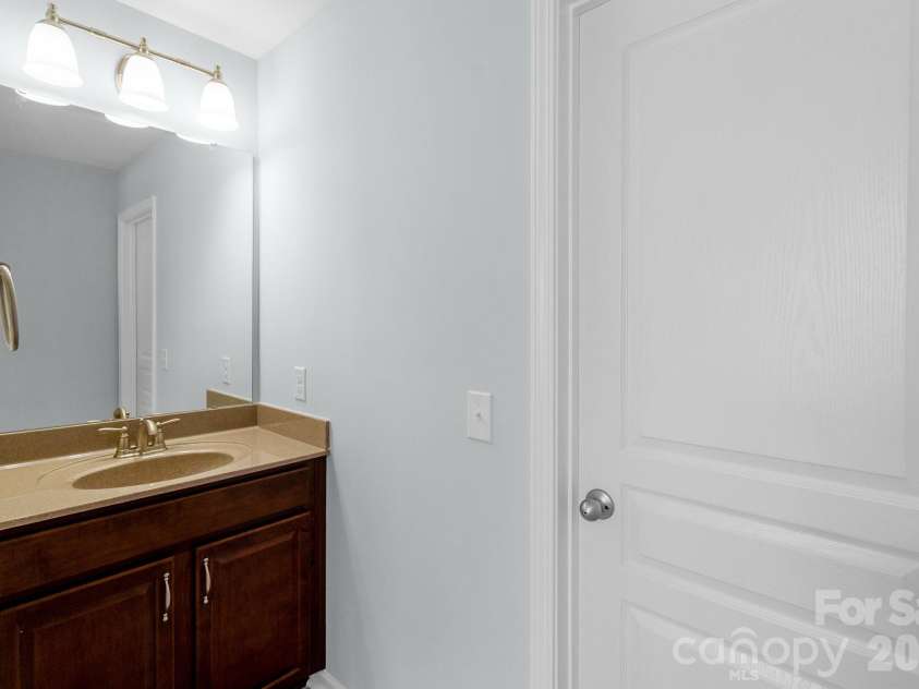 4419 Forest Gate Lane, Charlotte, NC 28270.  MLS# CAR4359056, YatesRealty ID 16405. Separate Vanity ensuite to full bath