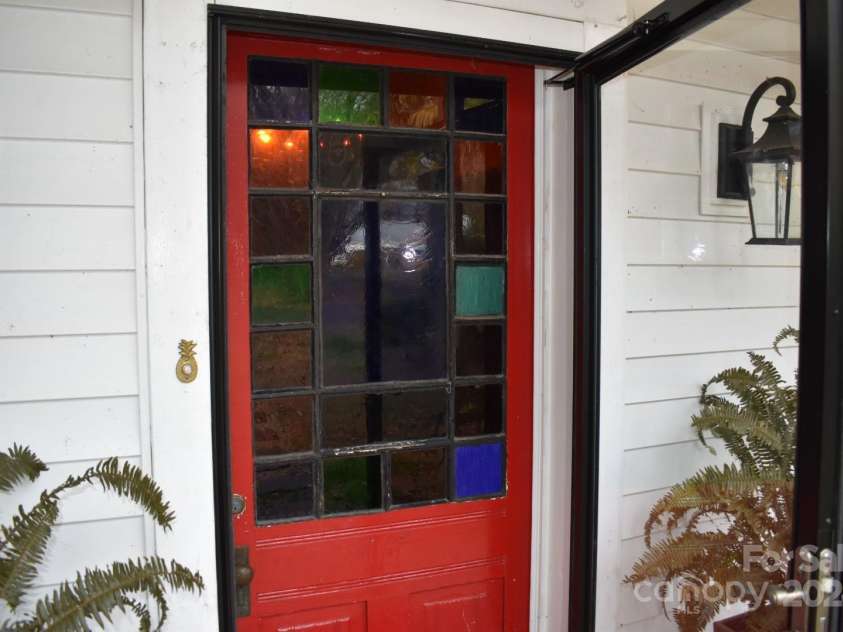 306 McAdenville Road, Lowell, NC 28098.  MLS# CAR4204195, YatesRealty ID 16406. Beautiful Stained Glass Front Door