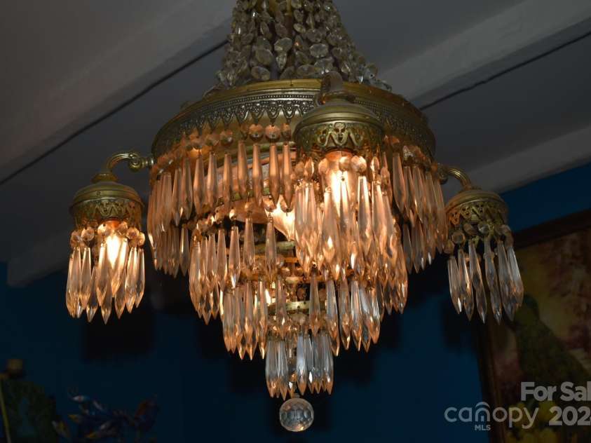 306 McAdenville Road, Lowell, NC 28098.  MLS# CAR4204195, YatesRealty ID 16406. Chandelier in Dining Room