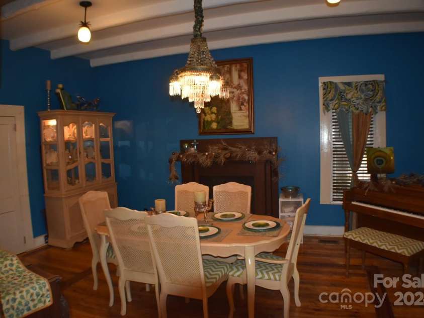 306 McAdenville Road, Lowell, NC 28098.  MLS# CAR4204195, YatesRealty ID 16406. Dining Room with Exposed Beams
