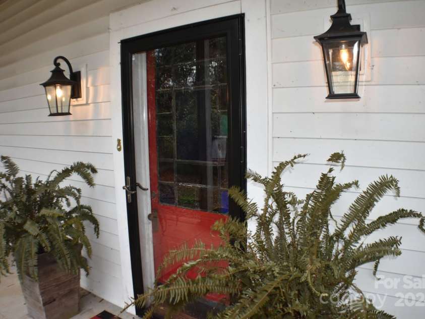 306 McAdenville Road, Lowell, NC 28098.  MLS# CAR4204195, YatesRealty ID 16406. Front Door