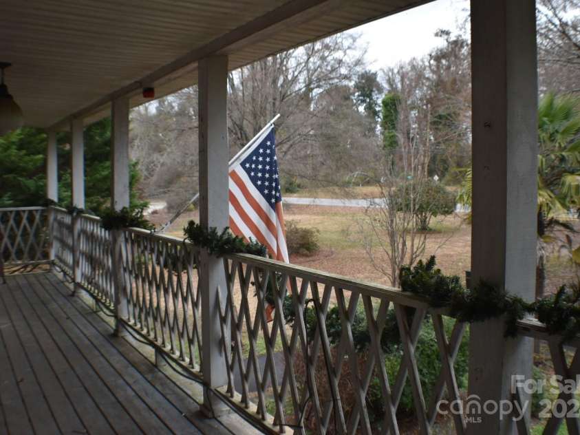 306 McAdenville Road, Lowell, NC 28098.  MLS# CAR4204195, YatesRealty ID 16406. Upper Front Porch