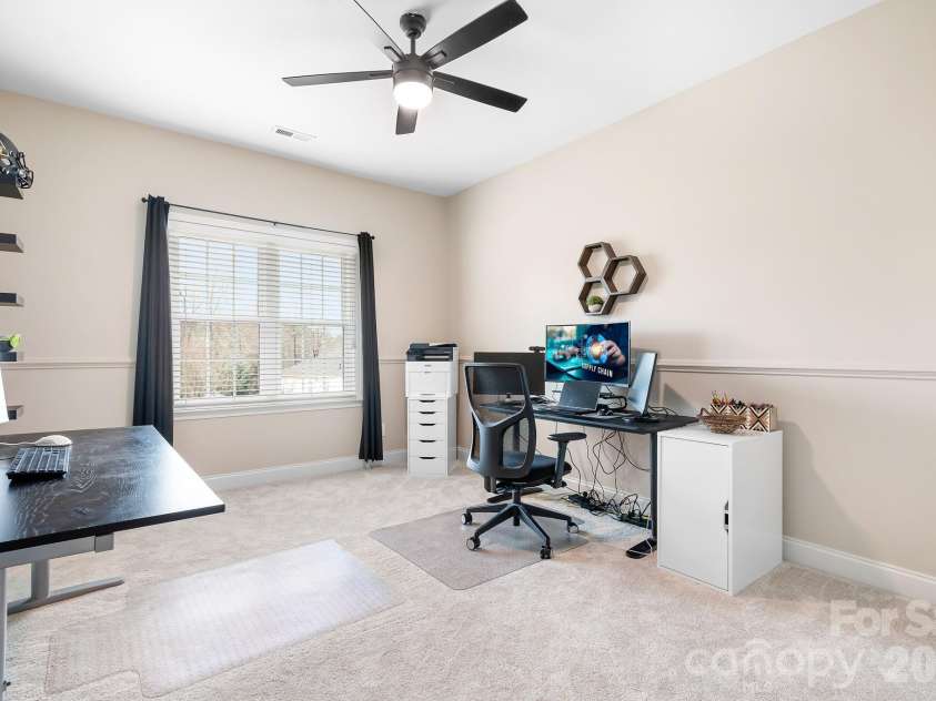 1546 Valhalla Drive, Denver, NC 28037.  MLS# CAR4353456, YatesRealty ID 16408. An upstairs bedroom that his currently bring used as an office space. 