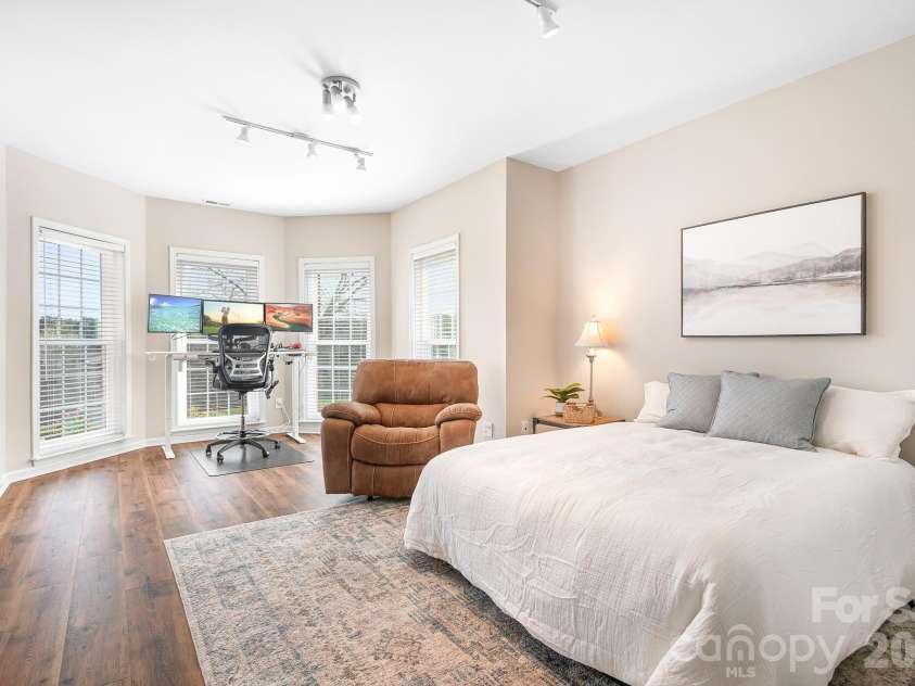 1546 Valhalla Drive, Denver, NC 28037.  MLS# CAR4353456, YatesRealty ID 16408. Another flex space on the lower level. Currently dual purpose as additional bedroom with a full bath across the hall, and as a workspace.  It could just be a 5th bedroom if needed. Wonderful views of the golf course and r