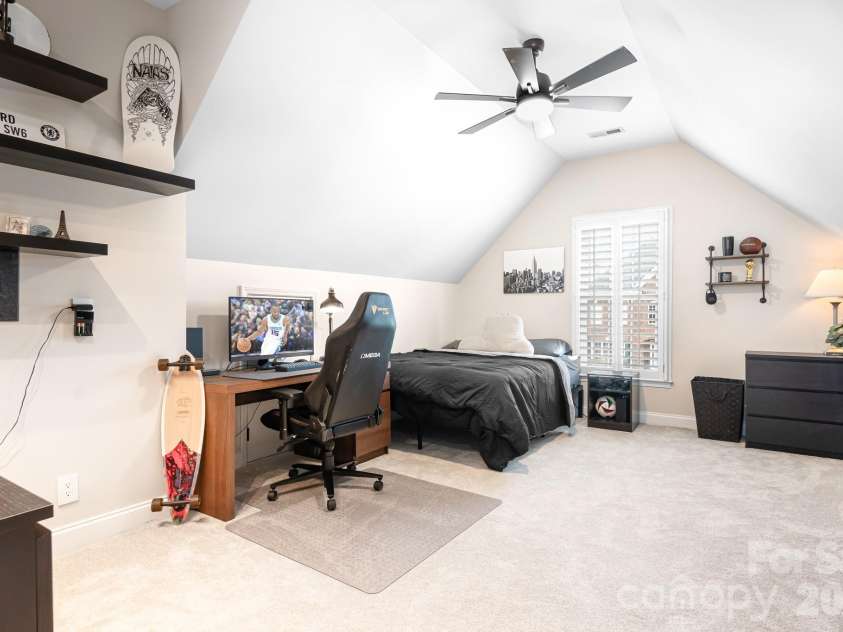 1546 Valhalla Drive, Denver, NC 28037.  MLS# CAR4353456, YatesRealty ID 16408. This bedroom could also be used as a second level bonus room. It is spacious and works well for sleeping space, as a work space and a TV area. Lots of room!  