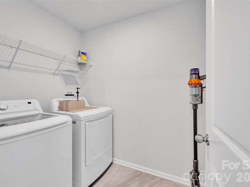 906 Park Bend Trail, Tega Cay, SC 29708.  MLS# CAR4363027, YatesRealty ID 16409. Laundry room upper