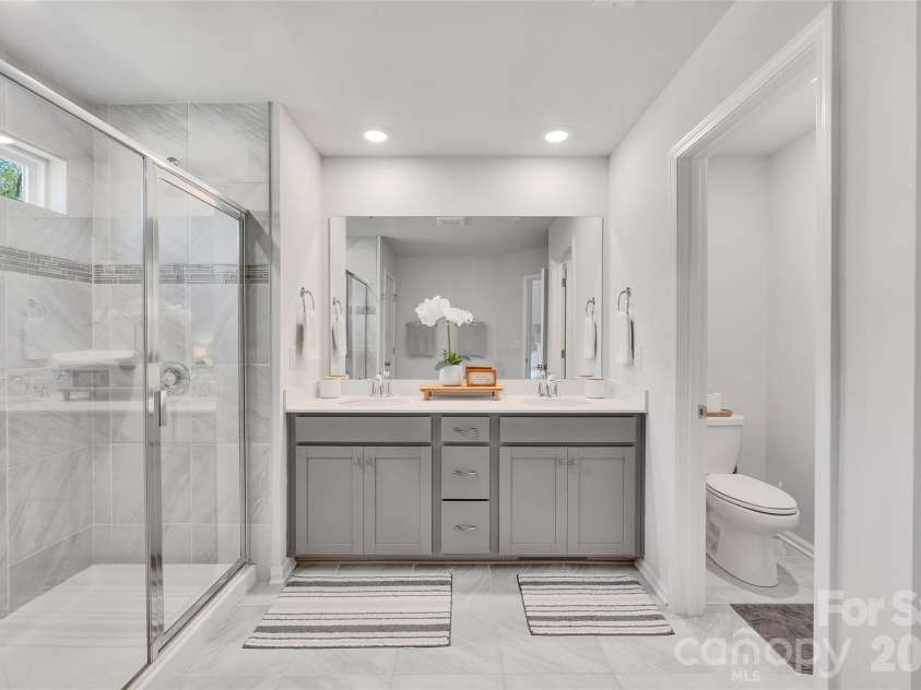 906 Park Bend Trail, Tega Cay, SC 29708.  MLS# CAR4363027, YatesRealty ID 16409. Primary Bath dual sinks, water closet