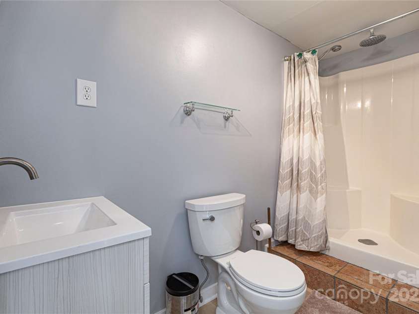 968 Plantation Drive, Marion, NC 28752.  MLS# CAR4322490, YatesRealty ID 1641. Basement full bath 