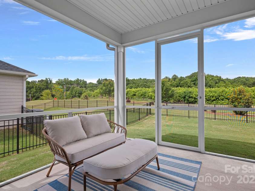 1344 Sweet Pea Street, Monroe, NC 28110.  MLS# CAR4265103, YatesRealty ID 16419. Enclosed Patio