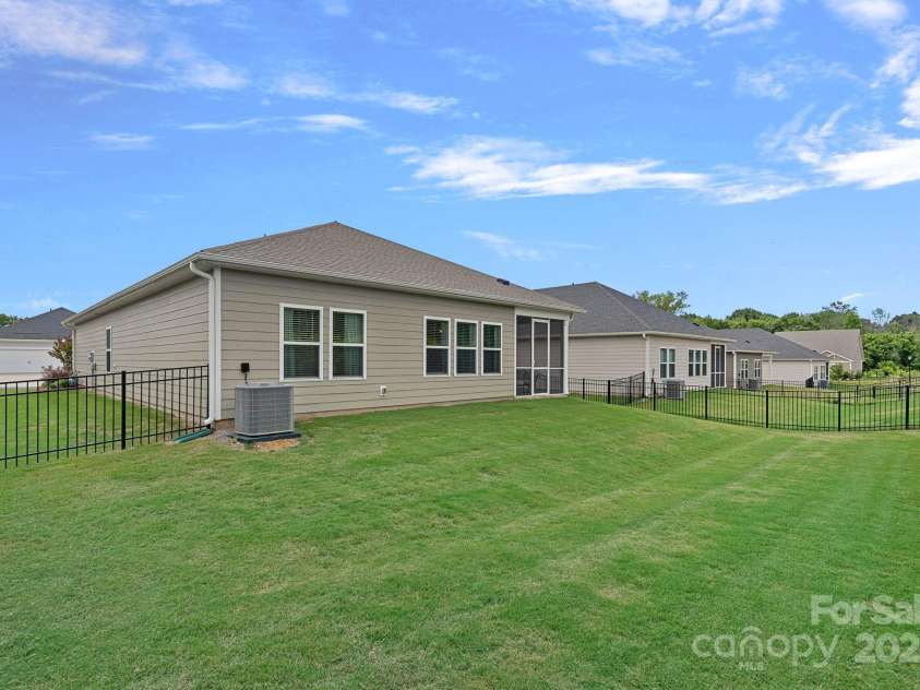 1344 Sweet Pea Street, Monroe, NC 28110.  MLS# CAR4265103, YatesRealty ID 16419. Large Backyard