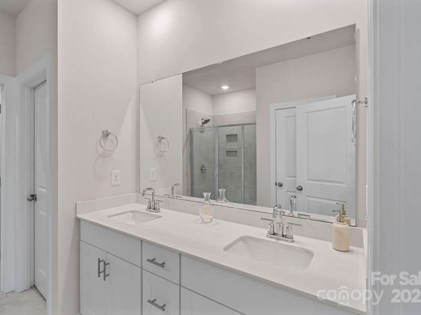 1344 Sweet Pea Street, Monroe, NC 28110.  MLS# CAR4265103, YatesRealty ID 16419. Primary Bathroom with large walk in closet