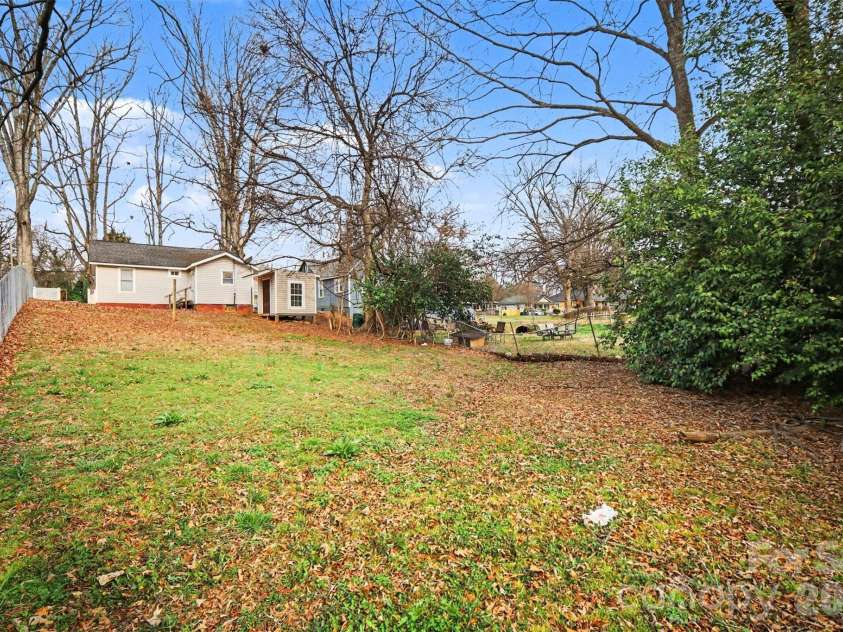 222 Linwood Avenue, Charlotte, NC 28216.  MLS# CAR4352513, YatesRealty ID 16419. Spacious backyard