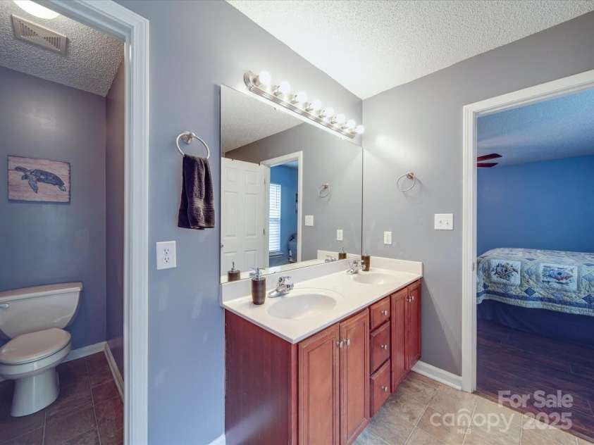 1060 Lentz Harness Shop Road, Mount Pleasant, NC 28124.  MLS# CAR4265582, YatesRealty ID 16422. Primary Bathroom