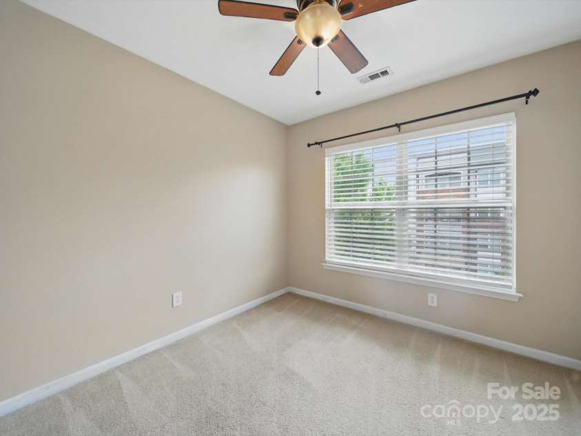 9564 Kings Parade Boulevard, Charlotte, NC 28273.  MLS# CAR4265254, YatesRealty ID 16423. Bedroom 2 on 3rd floor