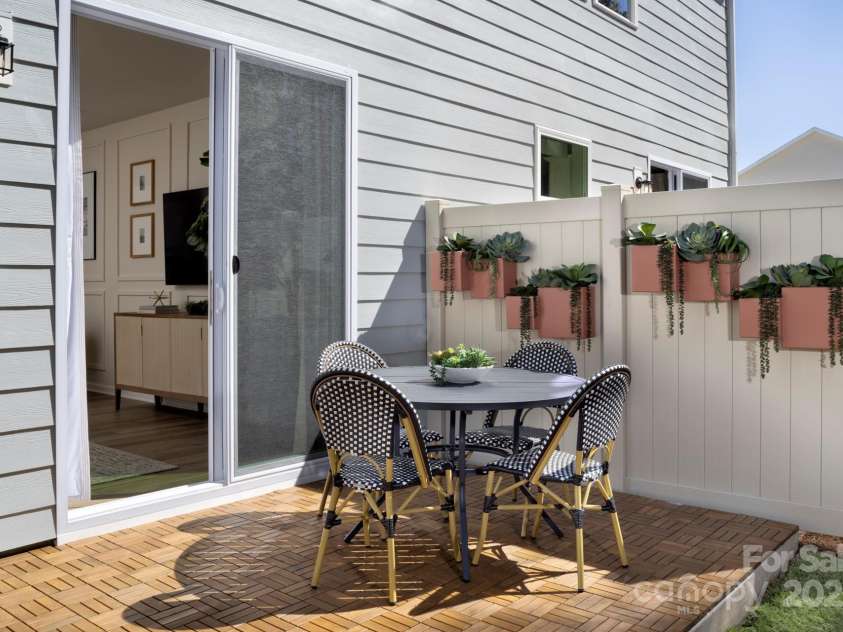 2485 Hedgecliff Road, Kannapolis, NC 28025.  MLS# CAR4265943, YatesRealty ID 16426. Outdoor Patio with 2 privacy walls each side-Sierra Decorated Model Home-like subject property