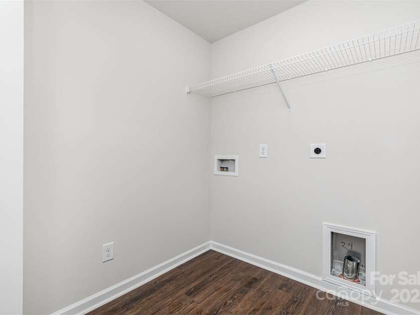2047 Sadler Woods Lane, Charlotte, NC 28214.  MLS# CAR4265581, YatesRealty ID 16429. Laundry. Representational Photo.
