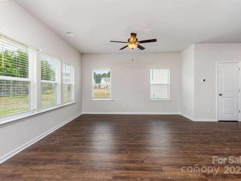 2047 Sadler Woods Lane, Charlotte, NC 28214.  MLS# CAR4265581, YatesRealty ID 16429. Living area. Representational Photo.