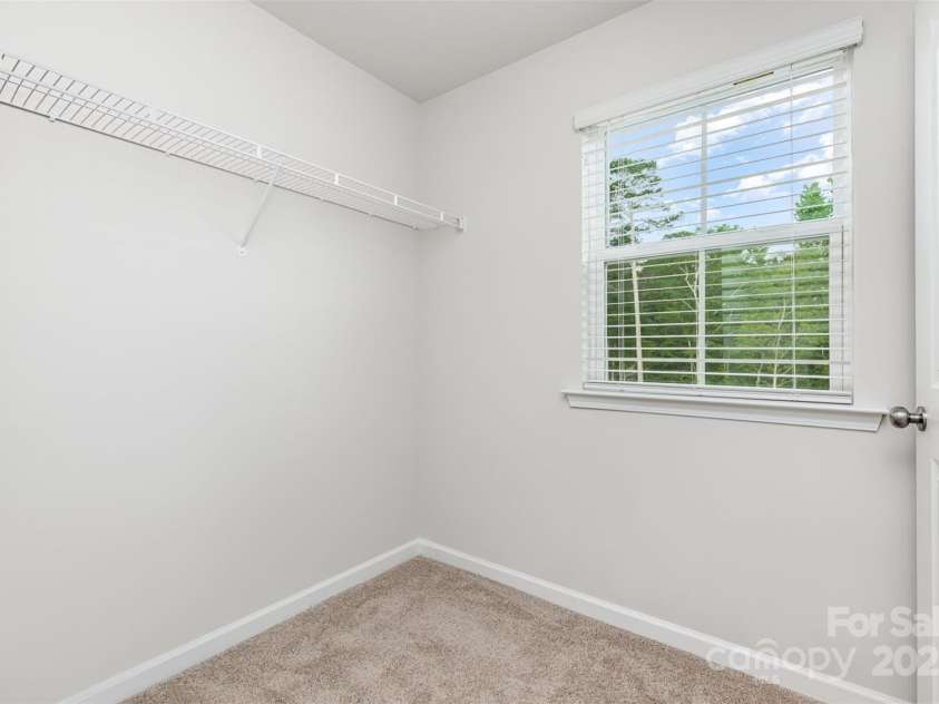 2047 Sadler Woods Lane, Charlotte, NC 28214.  MLS# CAR4265581, YatesRealty ID 16429. Walk-In Closet. Representational Photo.