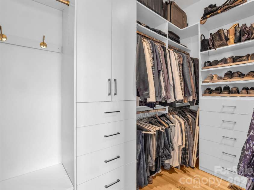 720 Overlook Drive, Flat Rock, NC 28731.  MLS# CAR4365121, YatesRealty ID 16429. Custom walk-in closet with built-in organization