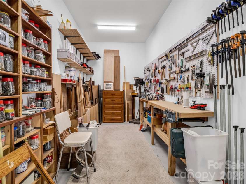 720 Overlook Drive, Flat Rock, NC 28731.  MLS# CAR4365121, YatesRealty ID 16429. Dedicated workshop for hobbies or storage