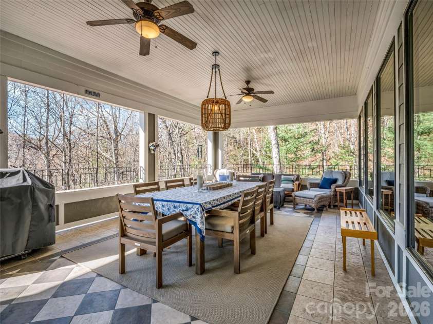 720 Overlook Drive, Flat Rock, NC 28731.  MLS# CAR4365121, YatesRealty ID 16429. Expansive covered patio for year-round enjoyment